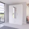 A white wardrobe with a mirrored door and three drawers is shown in a room with a large window and a grey rug. Voir les images du produit