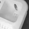 Close-up of a white sink or dish rack. Produktbild-Vorschau