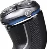 Close-up view of the head of a black electric shaver. Produktbild-Vorschau