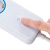A finger pressing a power button on a white power strip. Produktbild-Vorschau