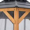 A close-up view of the wooden frame and metal roof of a gazebo. Náhled obrázku produktu