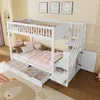 A white bunk bed with storage drawers and a ladder, set up in a child's bedroom with decorative items. Produktbild-Vorschau