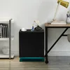 A black bedside table with three drawers and LED lighting on a wooden floor next to a white shelf and a desk. Produktbild-Vorschau