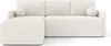 A cream-colored sectional sofa with a chaise lounge is shown from the front on a white background.