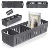 Multiple views of a gray plastic storage container for spice bags. Náhled obrázku produktu
