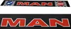 Two black strips with the 'MAN' logo in red and white, and traffic signs on the top strip. Produktbild-Vorschau