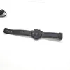 The back of a black smartwatch with a black strap is shown on a white background. Náhled obrázku produktu