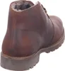 A brown leather boot with fur lining. Voir les images du produit