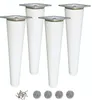 Four white furniture legs with silver mounting plates, along with screws and felt pads, are arranged on a white background. Podgląd zdjęcia produktu