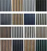 A collage of multiple samples of acoustic wall panels in various colors and wood finishes. Produktbild-Vorschau