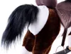 Close-up of the tail and hindquarters of a plush rocking horse. Voir les images du produit