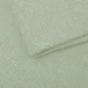 A close-up view of a folded green fabric. Produktbild-Vorschau