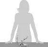 A silhouette of a person is shown behind a small metal sculpture of a diver with a shell. Dimensions are indicated with text. Podgląd zdjęcia produktu