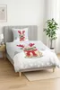 A children's bedding set with a pug wearing reindeer antlers and a scarf, displayed on a bed. Produktbild-Vorschau