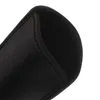 A close-up view of the opening of a black neoprene sleeve. Produktbild-Vorschau