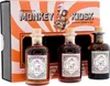 A gift set of Monkey 47 gin bottles displayed in front of their branded box. Produktbild-Vorschau