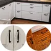 A collage of kitchen cabinets and cabinet handles. Produktbild-Vorschau