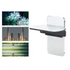 A collage of three images on the left and a product on the right. The images on the left depict abstract flowers, a cityscape, and a highway with cars. The product on the right is a smartphone photography accessory. Voir les images du produit