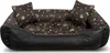 A dog bed with a paw print and bone pattern. Anteprima dell’immagine prodotto