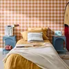 A bedroom scene with a bed, nightstands, and decorative items. Produktbild-Vorschau