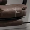 A close-up view of the armrest of a brown office chair, with a measurement indicating 9 cm. Voir les images du produit