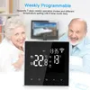 An older couple is smiling in the background behind a digital thermostat. Náhľad obrázku produktu