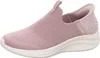 A side view of a pink Skechers slip-on shoe. Podgląd zdjęcia produktu