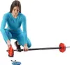 A woman is shown adjusting weights on a barbell. Produktbild-Vorschau