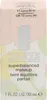 A close-up of a makeup product box with floral patterns. Produktbild-Vorschau