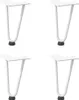 Four white hairpin legs for a table are arranged in a grid on a white background.