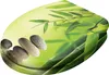 A close-up of a toilet seat with a bamboo and stone art design. Produktbild-Vorschau
