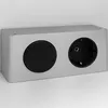 A close-up, studio shot of a silver electrical outlet unit with one black circular button and one black European-style socket. Produktbild-Vorschau