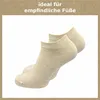 A pair of beige ankle socks on a white background. Produktbild-Vorschau