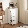 A white storage cabinet with four drawers is shown in a room with a wooden floor and a light-colored curtain. Náhled obrázku produktu