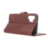 A brown leather flip case for a smartphone is shown from the side, with the front cover open. Produktbild-Vorschau