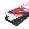 A close-up, angled view of a black smartphone case with a carbon fiber-like texture, with a smartphone screen displaying an abstract image partially inserted into it. Produktbild-Vorschau