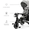 A close-up view of a gray and black Kinderkraft Jazz 2 foldable trike, with feature callouts and text. Voir les images du produit