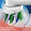 Close-up of an electric toothbrush head cleaning teeth, with arrows indicating movement and text highlighting plaque removal. Produktbild-Vorschau