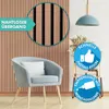 A modern living room setting with a chair and wall paneling. Podgląd zdjęcia produktu
