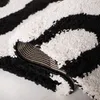 Hochflor-Teppich 99x160 cm, Elfenbein/Schwarz, Polypropylen Produktbild-Vorschau