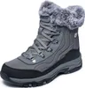 A single gray Skechers winter boot with faux fur trim is shown against a white background. Voir les images du produit