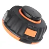 A close-up, angled view of a black and orange trimmer head against a white background. Podgląd zdjęcia produktu