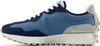 A side view of a New Balance sneaker. Anteprima dell’immagine prodotto