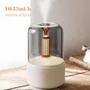Aroma diffuser with a warm white light, emitting mist. Podgląd zdjęcia produktu