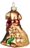 A glass ornament shaped like a golden retriever dog wearing a red scarf and sitting next to green leaves. Náhled obrázku produktu