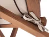 A close-up view of a cushion tie on a wooden chair. Produktbild-Vorschau