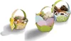 Three decorative Easter baskets filled with various items. Náhled obrázku produktu