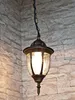 A hanging lantern against a stone wall. Náhled obrázku produktu