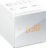 A white Sony cube-shaped digital alarm clock with an orange display showing the time. Anteprima dell’immagine prodotto