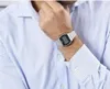 A close-up shot of a man's wrist wearing a silver digital watch. Produktbild-Vorschau